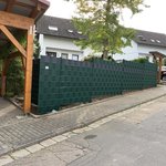 Doppelstabmatten leicht vorverzinkt und grün beschichtet mit Pfosten 60 x 40 mit Abdeckleisten einbetoniert wurde in Reichelsheim von Zaunteam Weschnitztal, Fürth im Jahr 2019 erstellt.