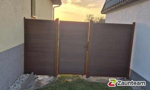 System WPC Sichtschutz, Platinum mit Alupfosten einbetoniert wurde in M von Zaunteam Fläming, Coswig im Jahr 2026 erstellt.